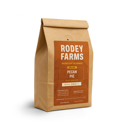 Brown paper bag of Rodey Farms pecan pie coffee on a white background